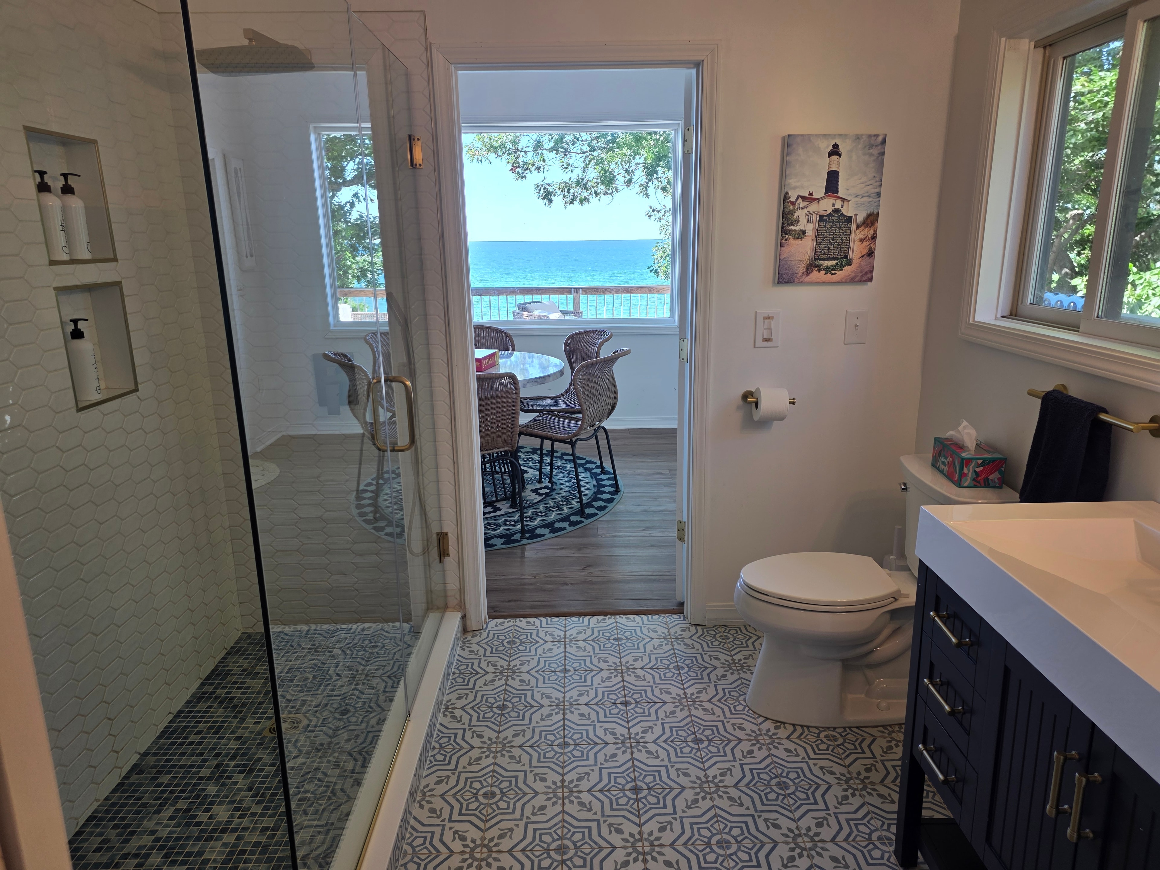 Bathroom with ocean view balcony