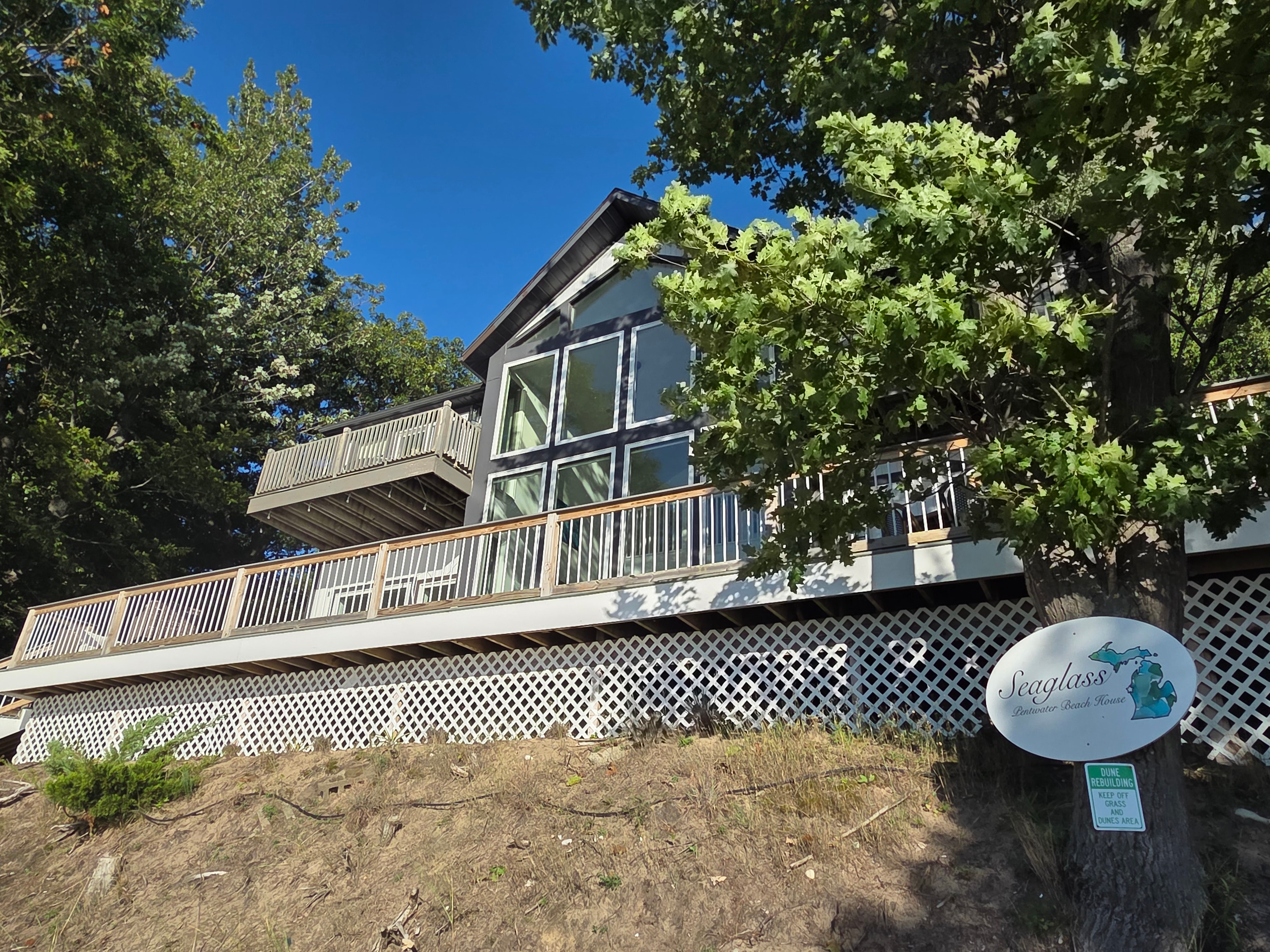 Beach house surrounded by trees