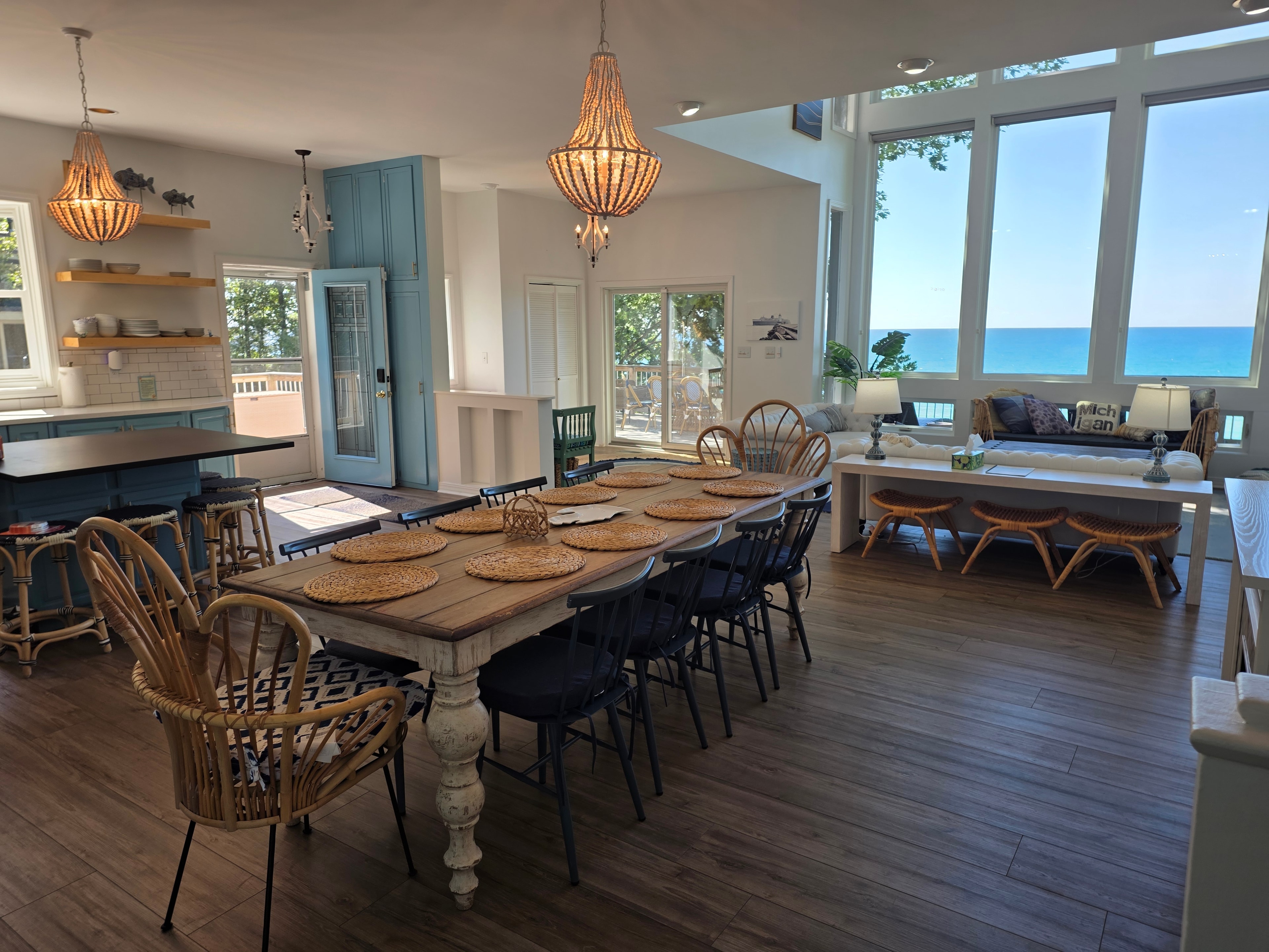 Open dining room with lake views and coastal decor