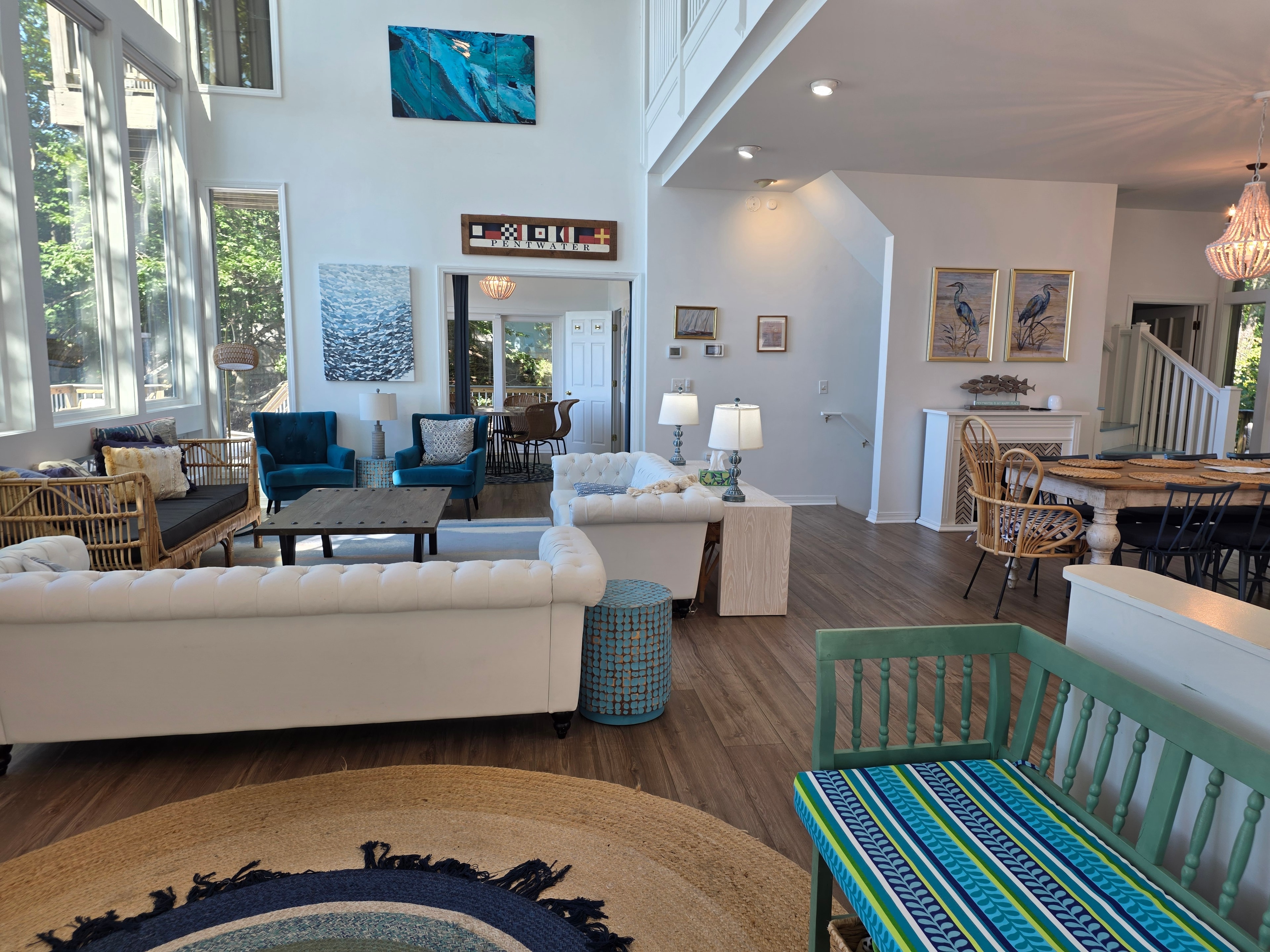 Coastal living room with open floor plan